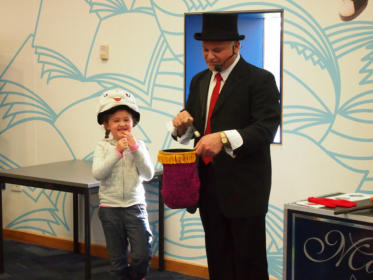 Adelaide Magic performing at a Library. 