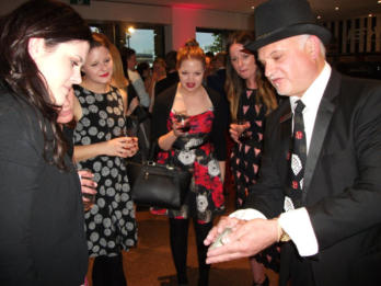 Adelaide Magician George performing at the Art Gallery of SA for a corporate event